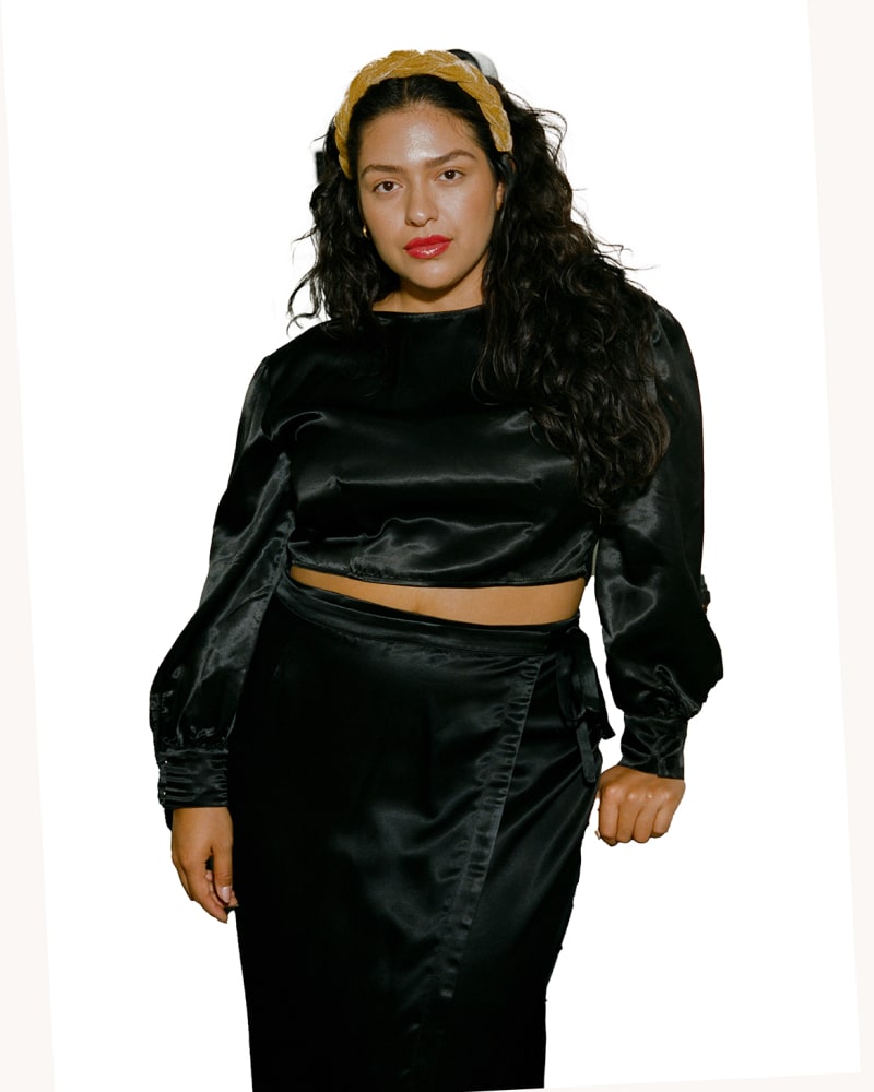 Front of a model wearing a size 2X Valentina Skirt in Black by Whimsy and Row. | dia_product_style_image_id:283842